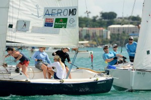 The USA&rsquo;s Stephanie Roble on the tiller in the black hulled boat in the foreground leads the USVI&rsquo;s Taylor Canfield, on the tiller in the boat behind, to win the final match of the 2015 CAMR, presented by AeroMD