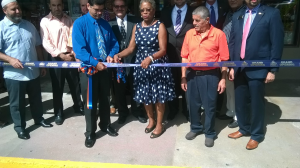 Delegate Christensen, Senator Sanes cutting ribbon
