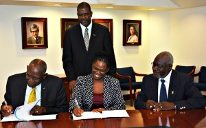 uvi-david-hall-sign-mou