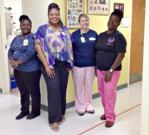 Dr. Mavis Mathew, center left and tallest, pose for a picture with J.F.L.'s Neonatal Unit nurses. Image Credit: JFL's Facebook Page.