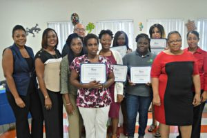 Staff of Michael Organization, along with scholarship awardees and their families. (Credit: Ernice Gilbert, VIC)