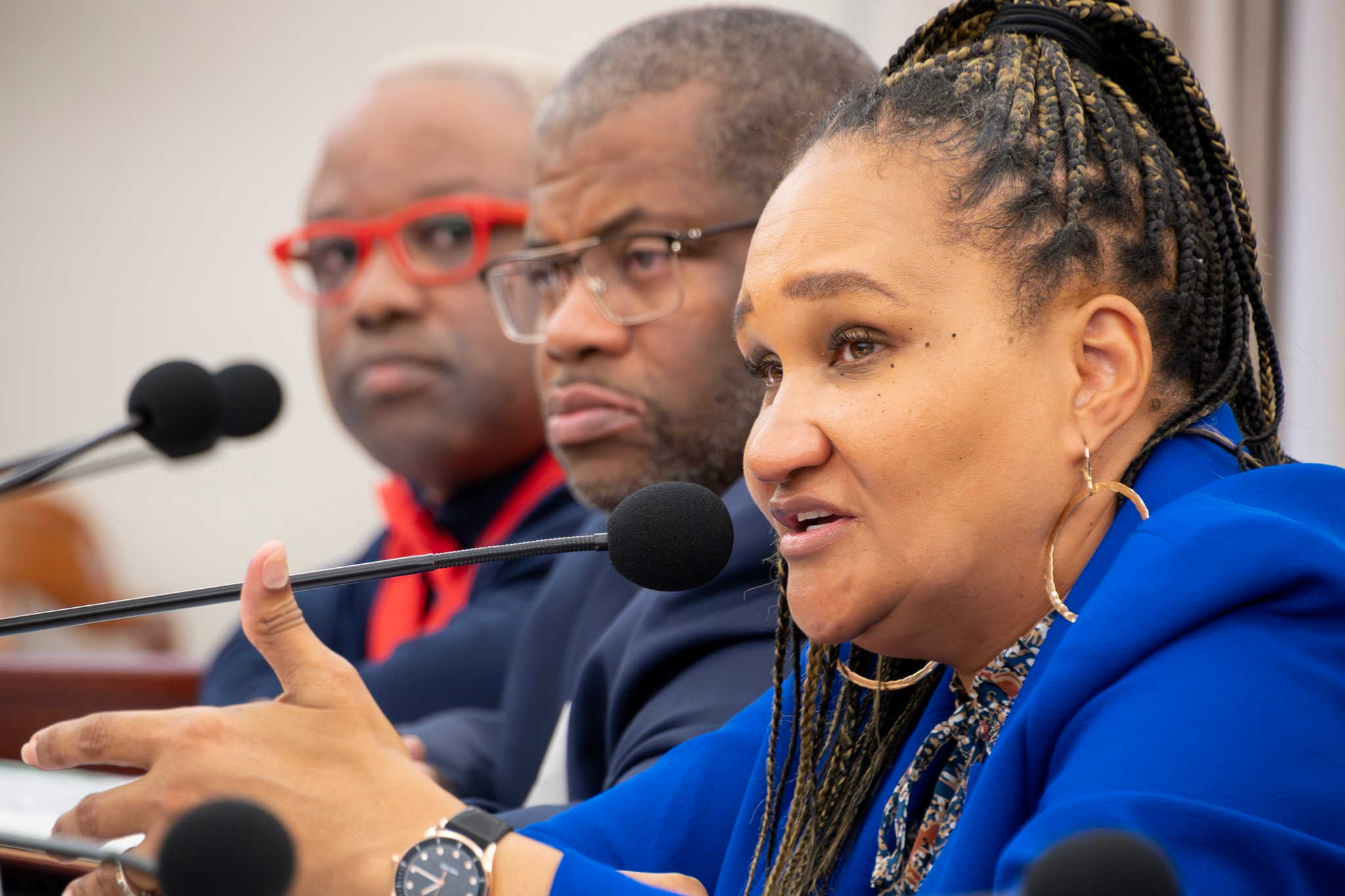 L2R: BOE Chair Kyza Callwood, and Education officials Stefan Jürgen and Dionne Wells-Hedrington