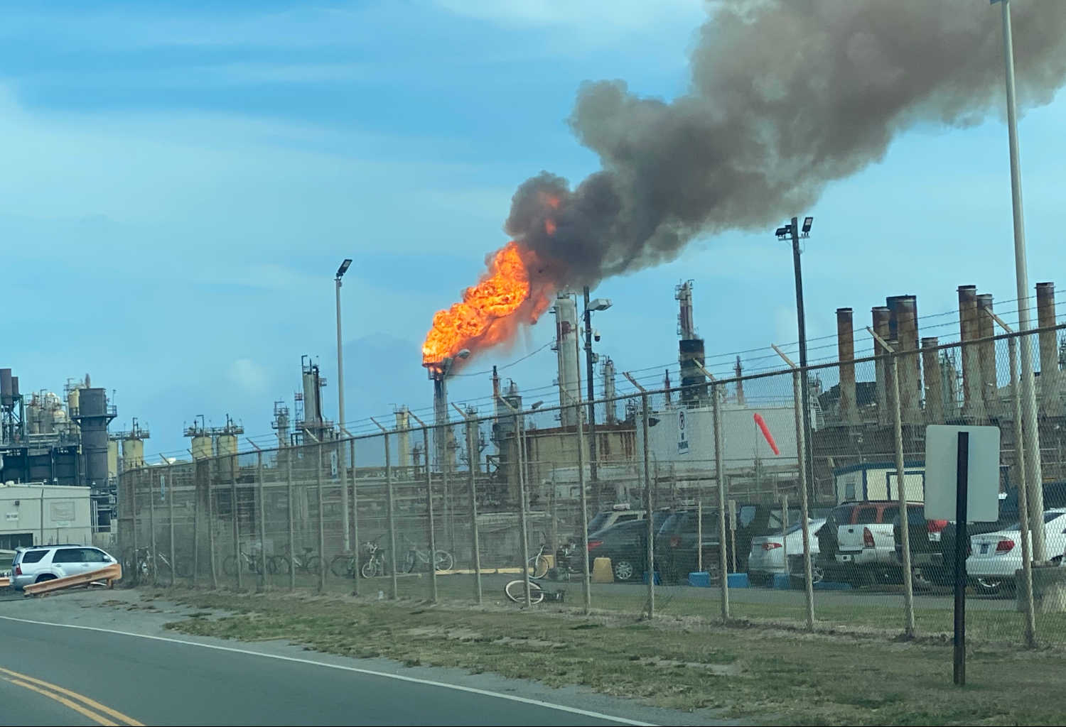 Smoke and fire rise from Limetree Bay Energy on Wednesday, May 12, 2021 following a massive flare incident at the plant's Coker Unit.