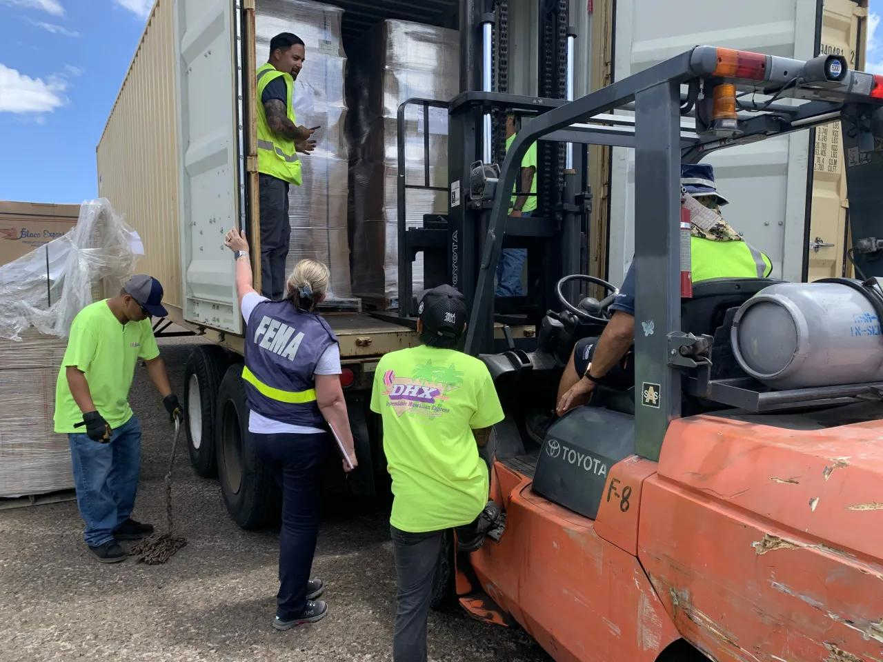 FEMA personnel work at the Mosquito Point bunker complex on St. Thomas, where the agency plans road improvements after two forklift accidents, including one that ejected a driver.