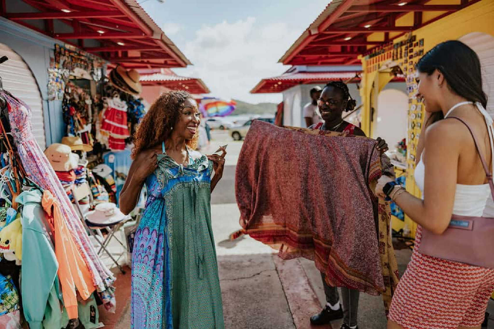 Shoppers browse colorful clothing and locally inspired goods in Charlotte Amalie, highlighting the mix of Caribbean character and retail experiences that helped earn the city a top-30 regional shopping ranking.