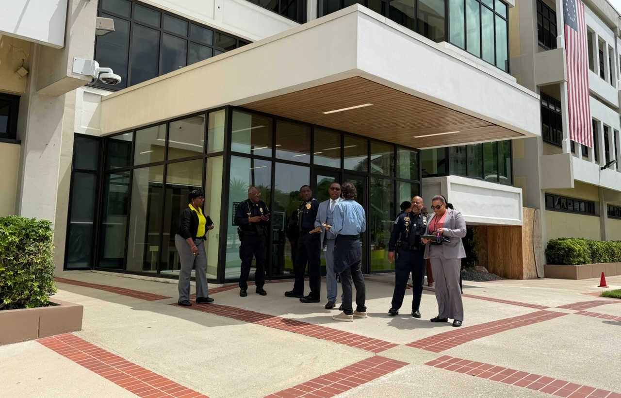VIPD officials outside the Ron de Lugo Federal Building and U.S. Courthouse on St. Thomas following the Sept. 11 consent decree hearing, as federal monitoring focuses on whether the department can sustain its reforms.